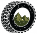 Black tire icon image with an image of the hills with a transparent background